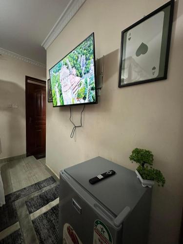 TV a/nebo společenská místnost v ubytování Toque Hotel