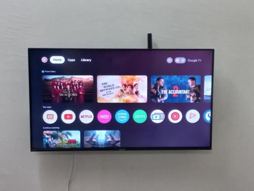 Μια τηλεόραση ή/και κέντρο ψυχαγωγίας στο DC Garden Homestay - wifi, netflix