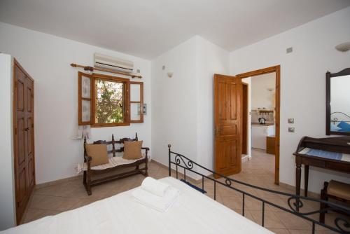 Postel nebo postele na pokoji v ubytování Hermes Apartment