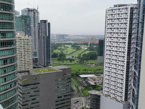 an aerial view of a city with tall buildings at Avant Serviced Suites - Personal Concierge in Manila