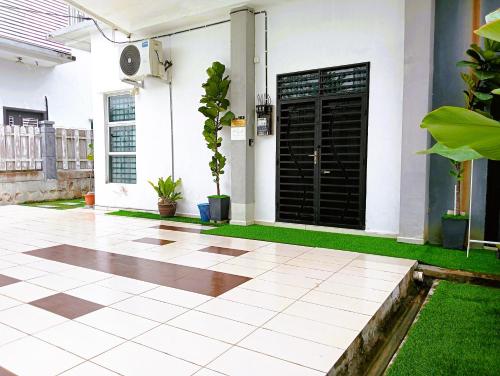 Fotografie z fotogalerie ubytování Sarrah Homestay At Kasa Height Residence v destinaci Kampong Alor Gajah