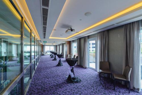 
The business area and/or conference room at Aqueen Hotel Paya Lebar (SG Clean, Staycation Approved)
