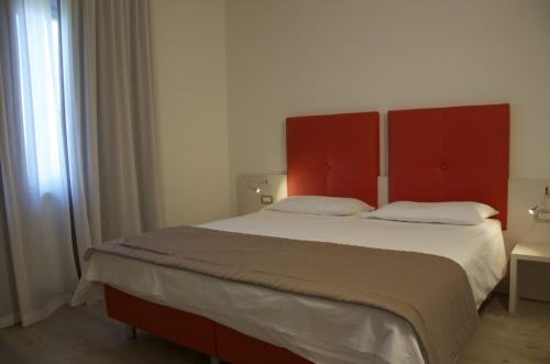 Letto o letti in una camera di Appartamenti Tre Colline