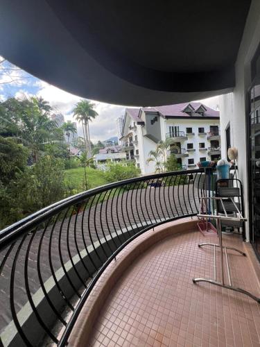 a balcony with a view of a building at Lovely apartment in Genting Highlands. in Genting Highlands