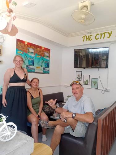 a group of people sitting in a room at The City Hostel in Phi Phi Don