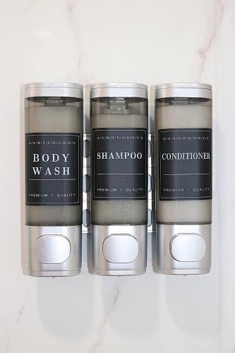 a group of three candles sitting on a counter at River Lane Studio in Riverview