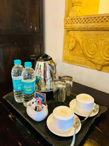 Hotel Jaisan Haveliにあるコーヒーまたはお茶