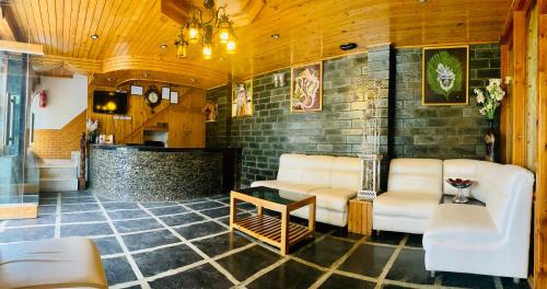 Posezení v ubytování Princess Hill Resort, Manali