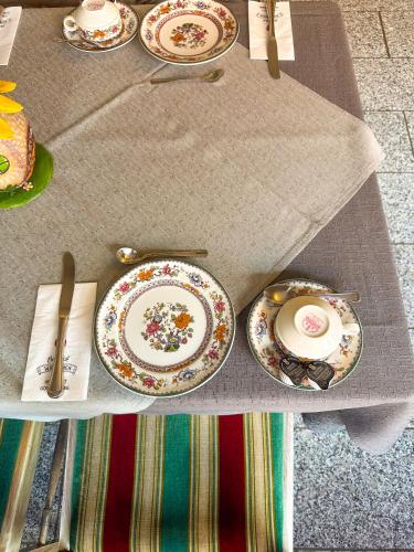an overhead view of a table with plates and utensils at Hotel Am Sportpark in Duisburg