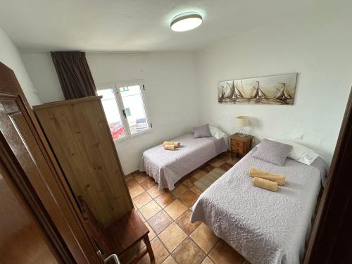 A bed or beds in a room at Isabel2
