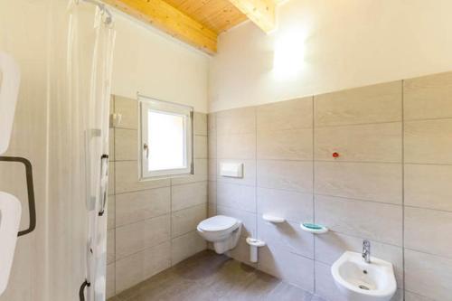 Koupelna v ubytování Residenza Cuntin