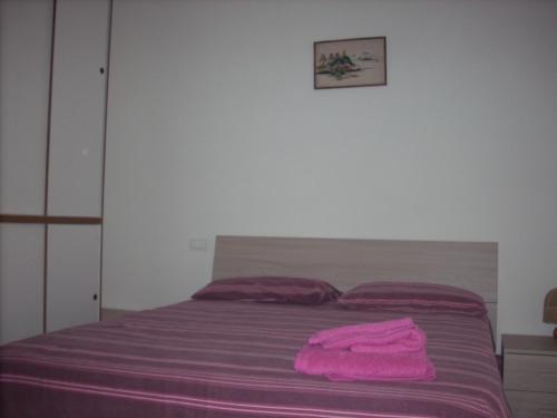 Postel nebo postele na pokoji v ubytování B&B Da Toni