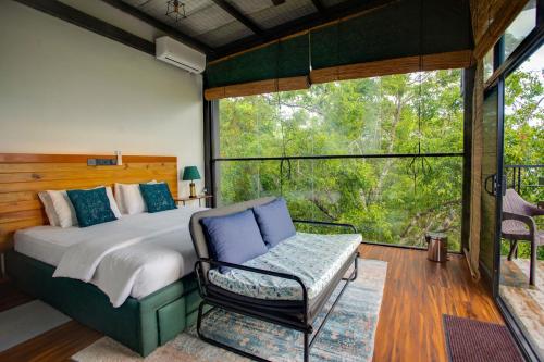 Llit o llits en una habitació de Manarala Villa