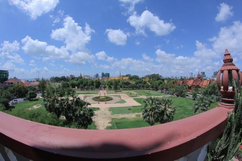 a view of a park from the balcony of a resort at Golden Noura Villa-Pub & Restaurant in Phnom Penh