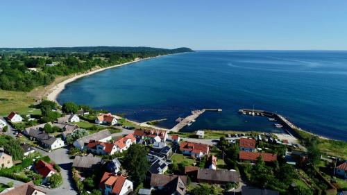 an aerial view of a small town next to the ocean at Villa Österlen på Viks fiskeläge in Simrishamn