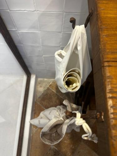 a bathroom with a toilet in a room at Nido di Gufi in Todi