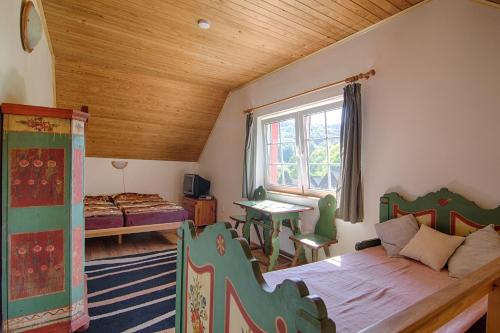 Postel nebo postele na pokoji v ubytování Penzion Neco