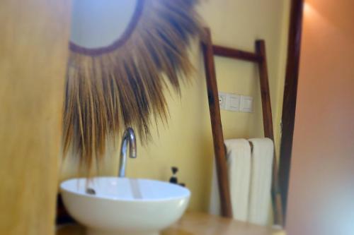 Ένα μπάνιο στο Amani Beach Villa