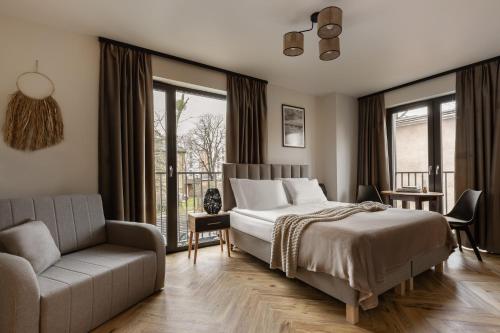 Posteľ alebo postele v izbe v ubytovaní Arte Gdańsk