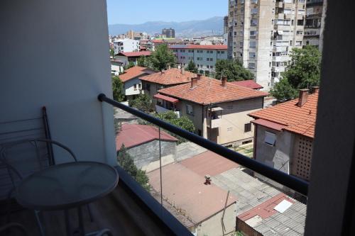 a view of a city from a balcony at Merlyn Apartment by Sienna in Skopje