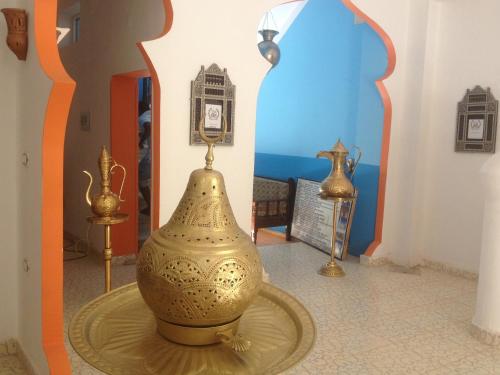 a vase sitting on a table in a room at Cleopatra Hotel Luxor in Luxor