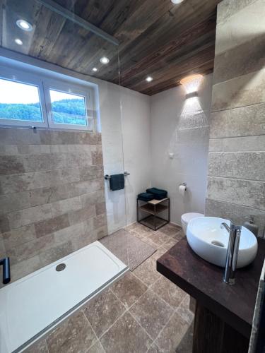 Ένα μπάνιο στο Appartement Sissi