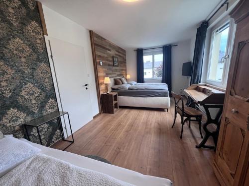Ένα ή περισσότερα κρεβάτια σε δωμάτιο στο Appartement Sissi