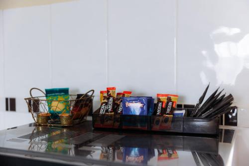 a counter top with two baskets of drinks and chopsticks at Scone Motor Inn & Apartments in Scone