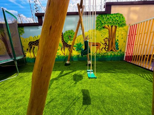 Zona de juegos infantil en The Red Mirage --- Rooftop Pool, Gym, Games room, Netflix 2BD & SQ