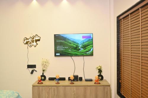 The Cozy Nestにあるテレビまたはエンターテインメントセンター