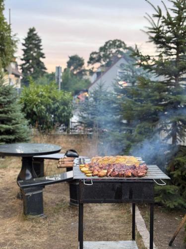 a grill with a bunch of food on it at Hotel Kennedy in Nürnberg