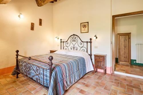 Ένα ή περισσότερα κρεβάτια σε δωμάτιο στο Agriturismo Cacciamici