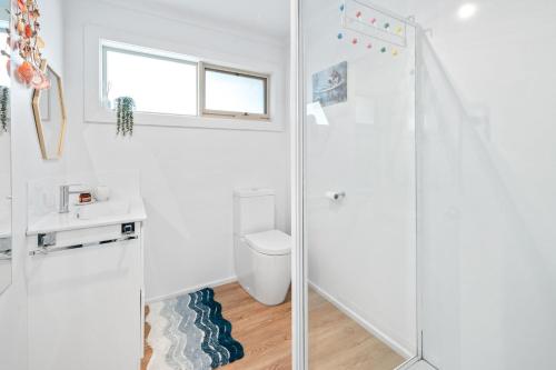 Koupelna v ubytování Sandy Toes and Salty Kisses