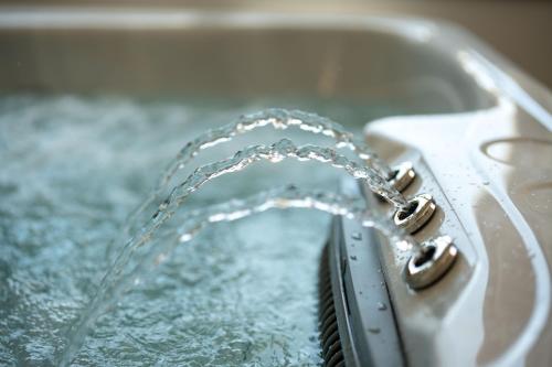 a water hose coming out of a sink at NEW Yiota Collection 4 Suites & 4 Prive Jacuzzi in Megalokhori