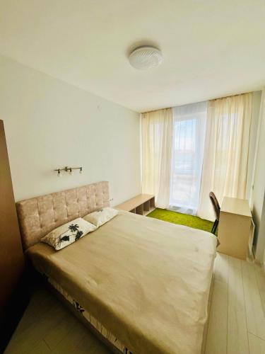 Ένα ή περισσότερα κρεβάτια σε δωμάτιο στο New Apartments