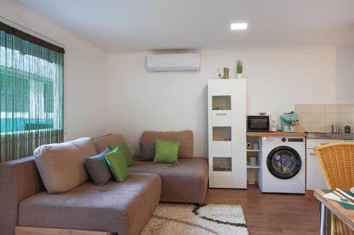 Posezení v ubytování Gunaras Apartman RT