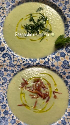 two plates of food with broccoli on a table at Al Lago in Zahara de la Sierra