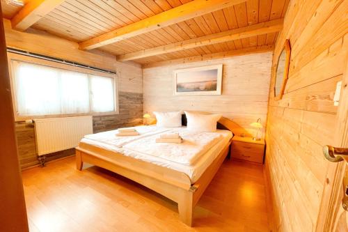 Katil atau katil-katil dalam bilik di Ferienhaus Usedom Idyll