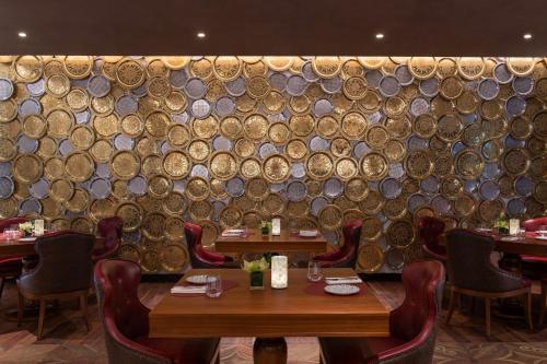 Zona de estar de Abesq Doha Hotel and Residences, an IHG Hotel