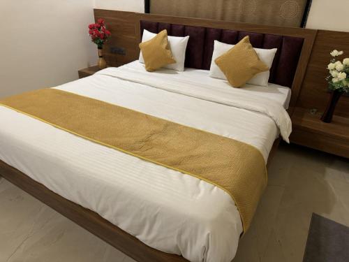 Ένα ή περισσότερα κρεβάτια σε δωμάτιο στο Hotel Park Areca, Jaipur