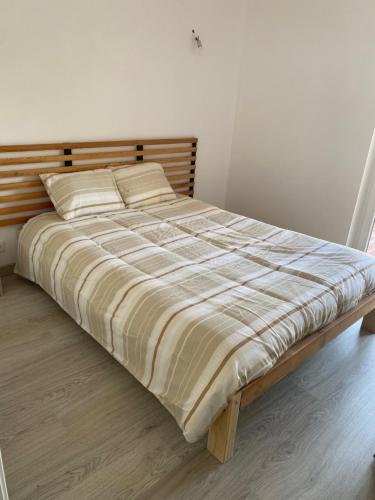Ένα ή περισσότερα κρεβάτια σε δωμάτιο στο Casa Os Três Meninos