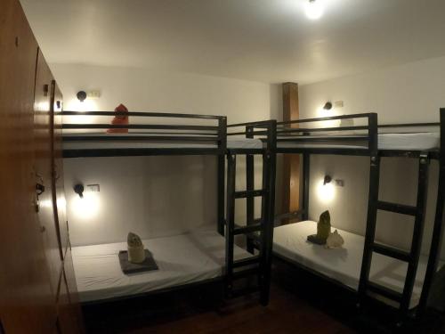 Postel nebo postele na pokoji v ubytování Bangka Hostels