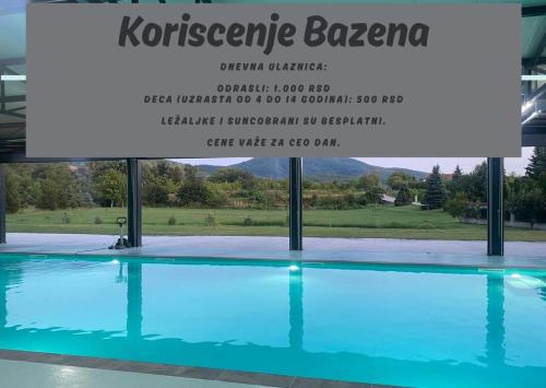 a sign for a swimming pool in a building at Novapark in Ždrelo