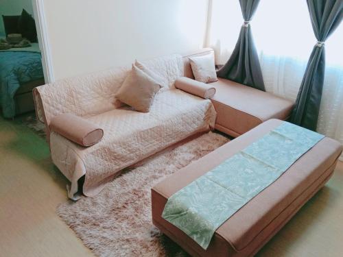 Ein Bett oder Betten in einem Zimmer der Unterkunft Moore HQ 1BEDROOM Avida Tower 2