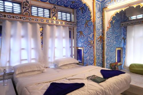 Katil atau katil-katil dalam bilik di Island Tower Boutique Hotel