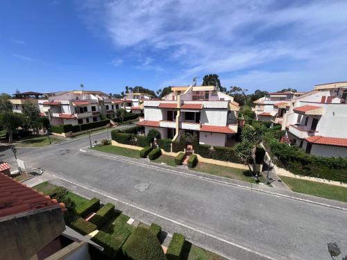 an empty street in a town with houses at La Casa Serena in Scalea