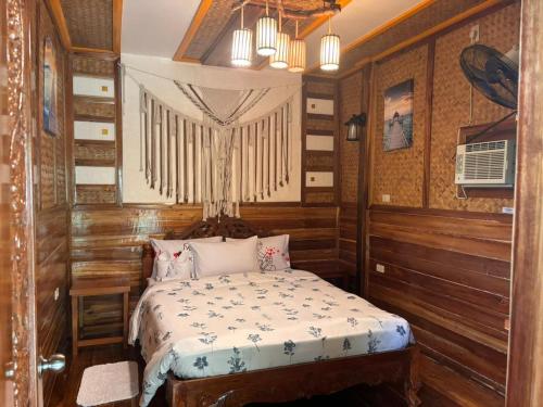 Postel nebo postele na pokoji v ubytování BING-VICE Tourist Inn