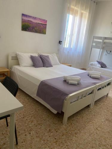 Katil atau katil-katil dalam bilik di Bed and Breakfast La Marianaccia