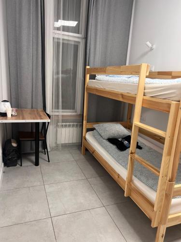 Postel nebo postele na pokoji v ubytování Golden Hostel