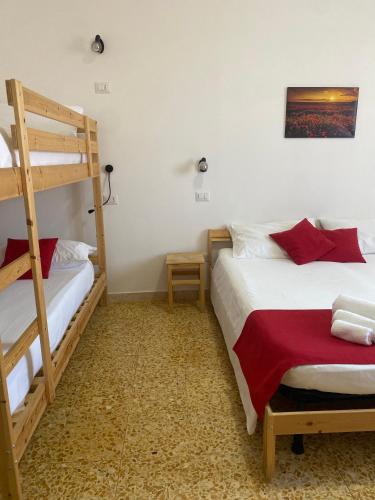Katil atau katil-katil dalam bilik di Bed and Breakfast La Marianaccia